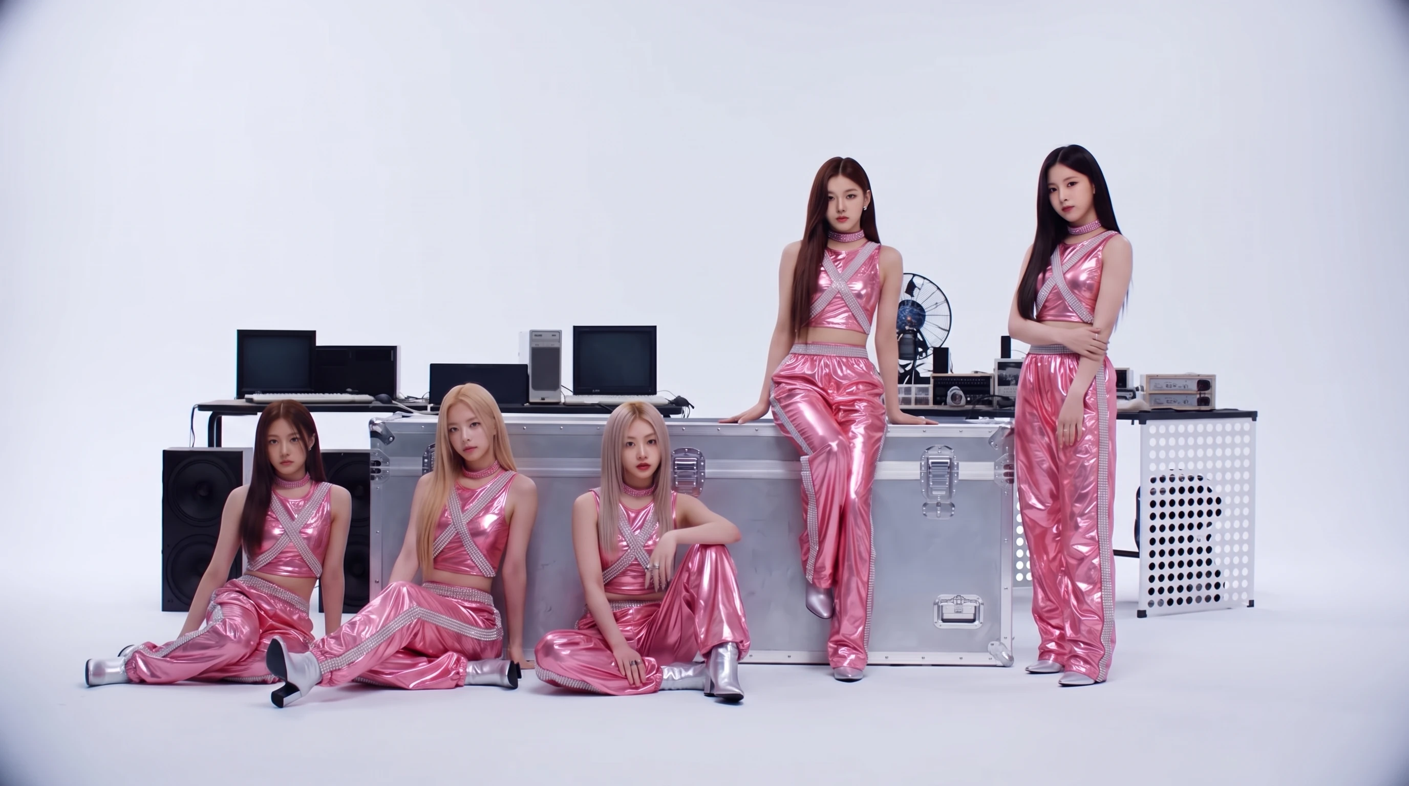 XNOVA's metallic pink styling in a bright studio with chrome equipment